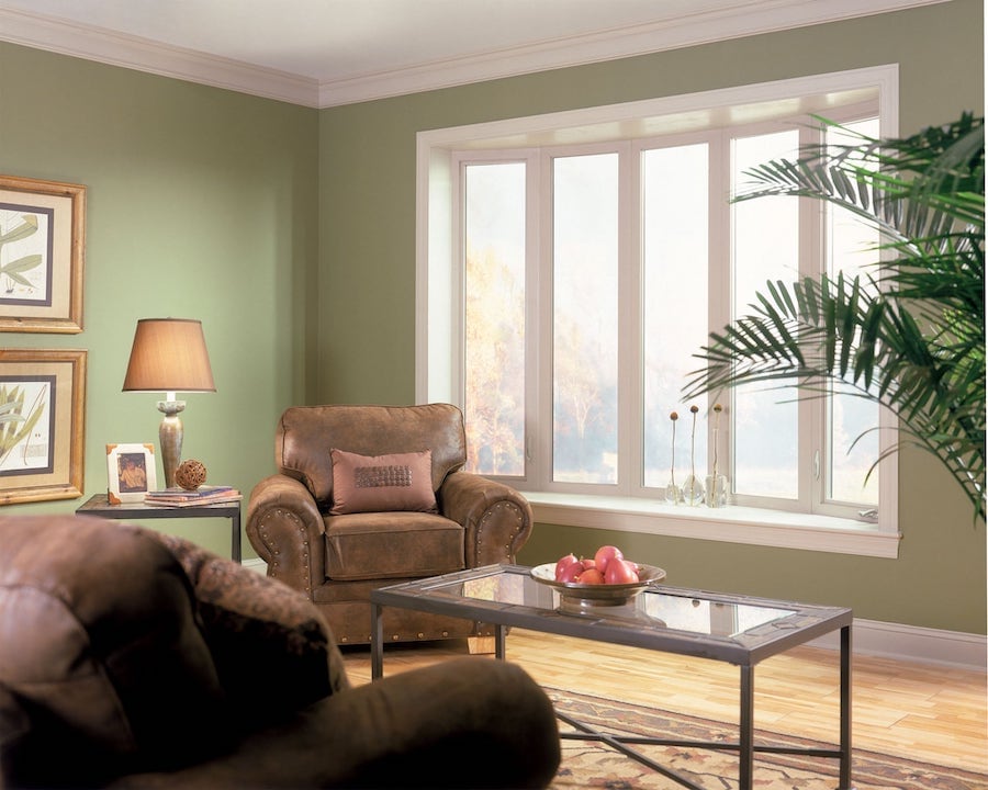 Bay and bow windows let light into living room.