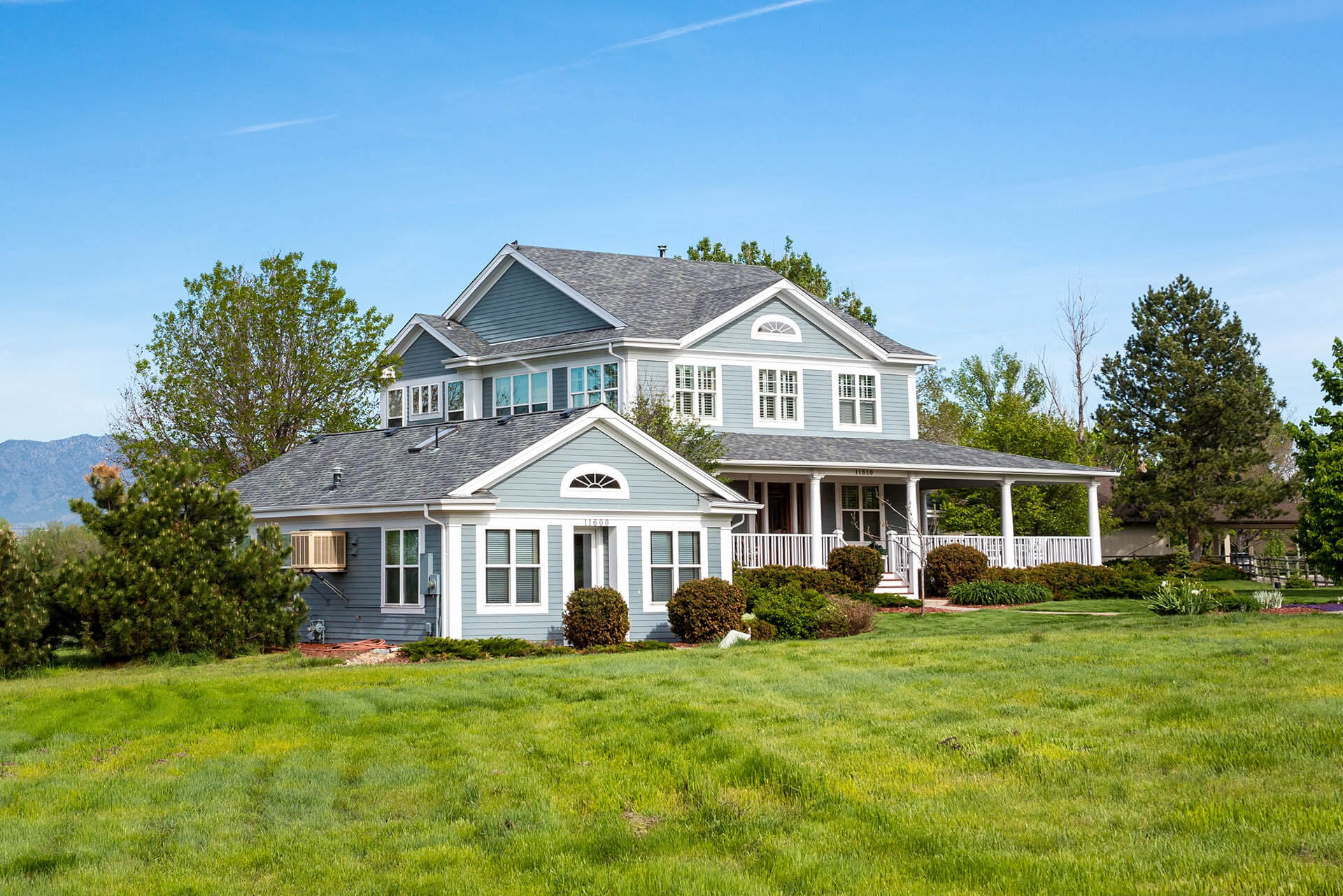 Front exterior of large, ranch style home