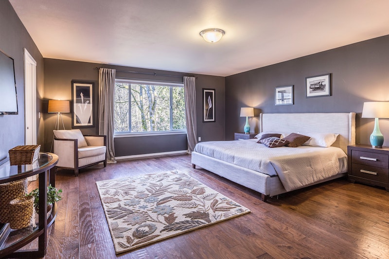 bedroom with long curtains